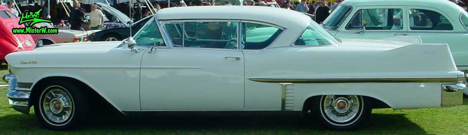 Sideview of a white 1957 Cadillac Coupe DeVille