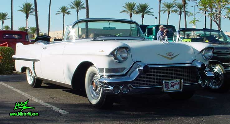 Photo of a white 1957 Cadillac Series 62 Convertible at the Scottsdale Pavilions Classic Car Show in Arizona. 1957 Cadillac Convertible at the Scottsdale Pavillions Classic Car Show in Arizona