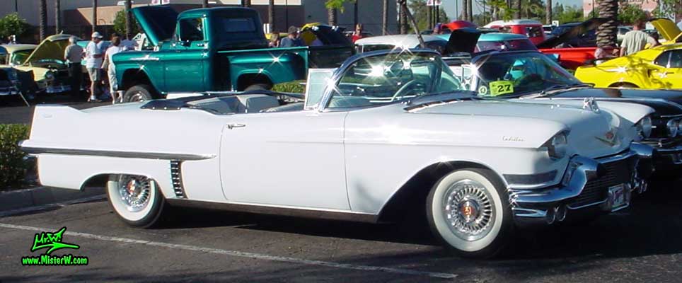 Photo of a white 1957 Cadillac Series 62 Convertible at the Scottsdale Pavilions Classic Car Show in Arizona. 