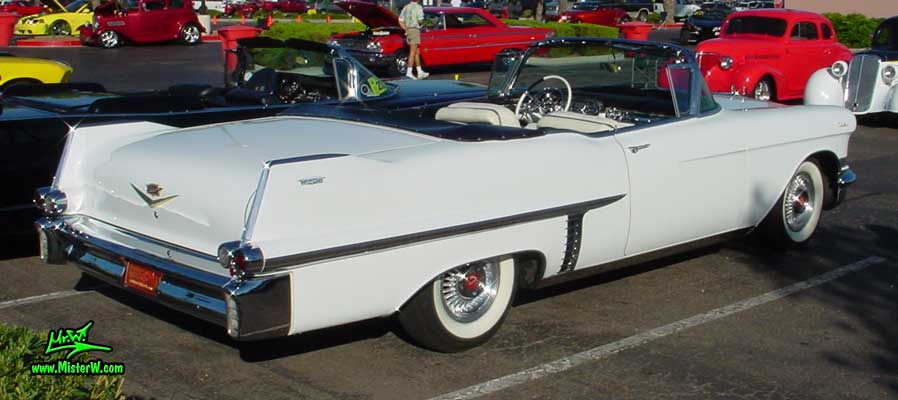 Photo of a white 1957 Cadillac Series 62 Convertible at the Scottsdale Pavilions Classic Car Show in Arizona. Topless 1957 Cadillac