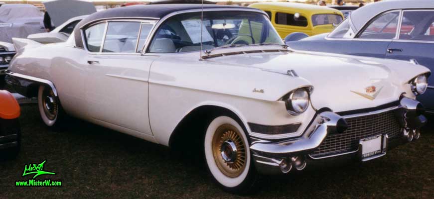 Photo of a white 1957 Cadillac Eldorado SeVille 2 Door Hardtop Coupe at a classic car auction in Scottsdale, Arizona. Wihte 1957 Cadillac Eldorado SeVille with black roof