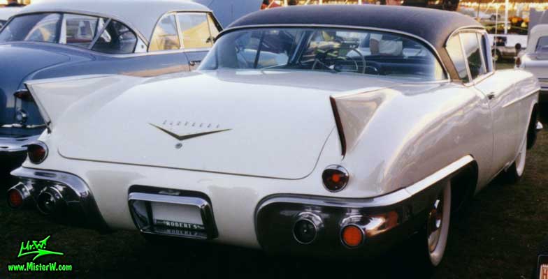 Photo of a white 1957 Cadillac Eldorado SeVille 2 Door Hardtop Coupe at a classic car auction in Scottsdale, Arizona. 