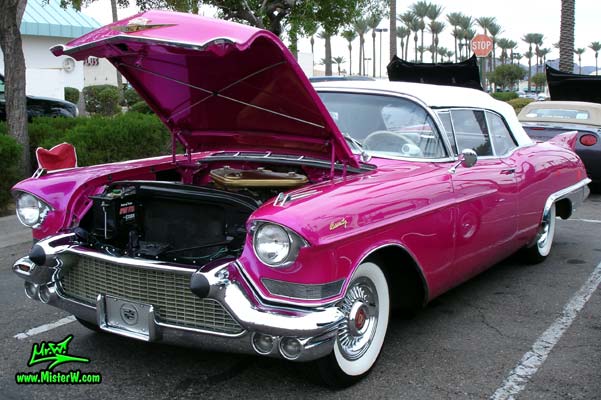 Photo of a purple violet 1957 Cadillac Eldorado Biarritz Convertible at the Scottsdale Pavilions Classic Car Show in Arizona. 57 Cadillac Eldorado Biarritz Convertible