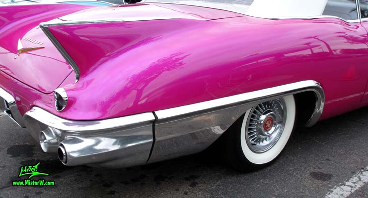Photo of a purple violet 1957 Cadillac Eldorado Biarritz Convertible at the Scottsdale Pavilions Classic Car Show in Arizona. Tailfin of a 1957 Cadillac Eldorado Biarritz Convertible