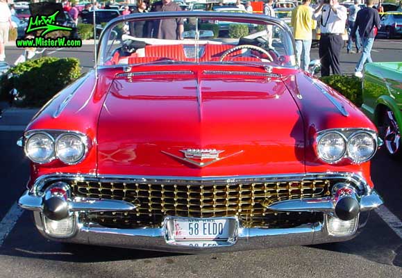 Photo of a red 1958 Cadillac Eldorado Biarritz Convertible at the Scottsdale Pavilions Classic Car Show in Arizona. 1958 Cadillac Eldorado