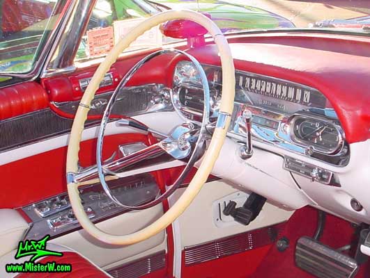 Photo of a red 1958 Cadillac Eldorado Biarritz Convertible at the Scottsdale Pavilions Classic Car Show in Arizona. 1958 Cadillac Eldorado Biarritz Steering Column