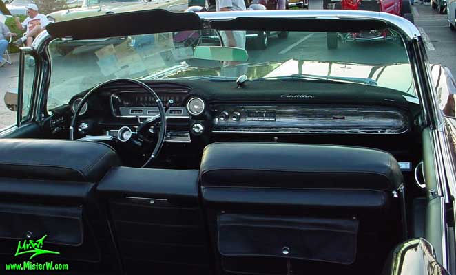 Photo of a black 1960 Cadillac Convertible at the Scottsdale Pavilions Classic Car Show in Arizona. Dashboard of a 1960 Cadillac Convertible