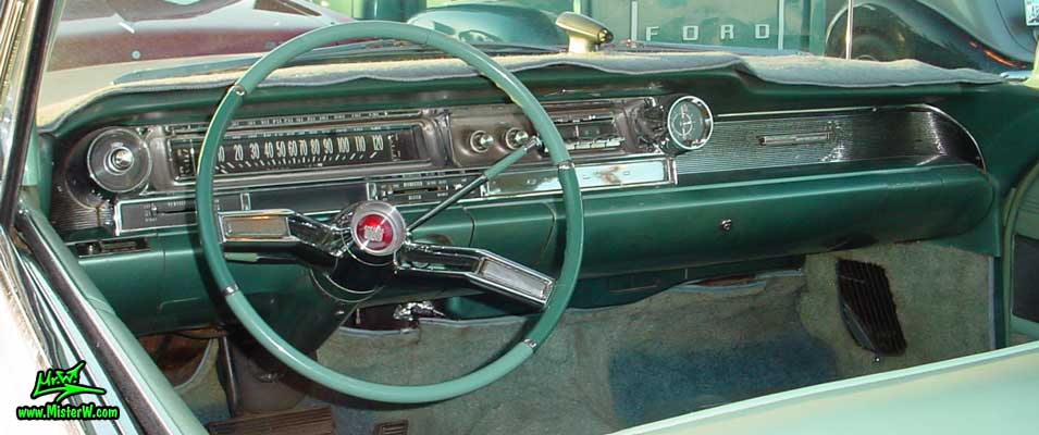 Photo of a white 1961 Cadillac 2 Door Hardtop Coupe at the Scottsdale Pavilions Classic Car Show in Arizona. 1961 Cadillac Dashboard