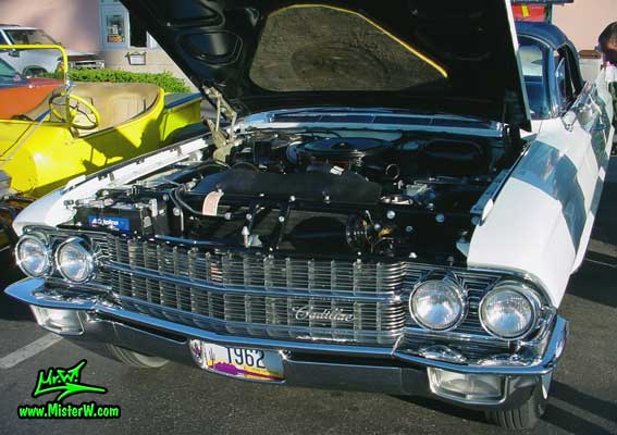 Photo of a white 1962 Cadillac Convertible at the Scottsdale Pavilions Classic Car Show in Arizona. 1962 Cadillac Motor