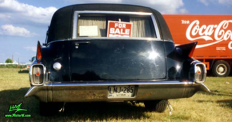 Photo of a black 1962 Cadillac Hearse at a classic car meeting in Germany. 1962 Cadillac Hearse Rearview