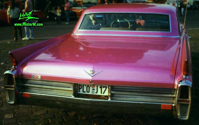 Photo of a pink 1963 Cadillac 2 Door Hardtop Coupe at a classic car meeting in Germany. 1963 Caddy