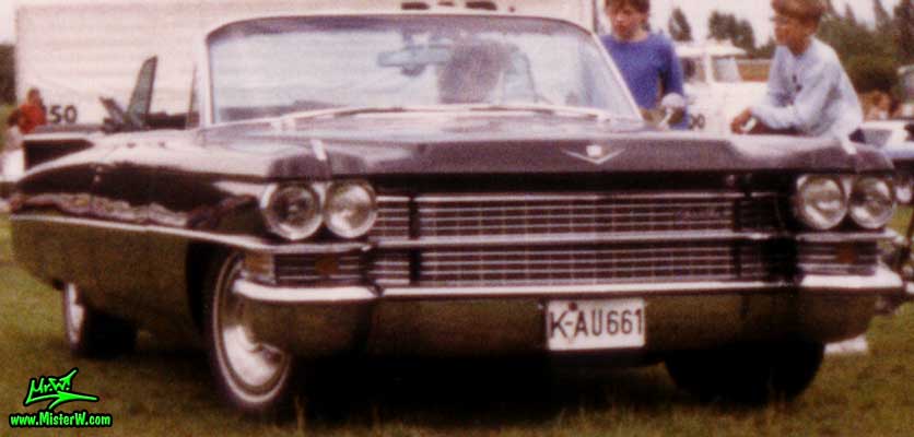 Photo of a black 1963 Cadillac Convertible at a classic car meeting in K�ln Chorweiler (Cologne), Germany. 1963 Caddy Convertible