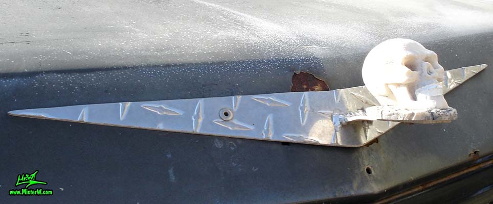 Photo of a lifted dark grey 1963 Cadillac 4x4 Off Road Sedan deVille 4 Door Hardtop in Phoenix, Arizona. Lifted 4x4 Off Road 1963 Cadillac Sedan deVille Custom Skull Hood Ornament