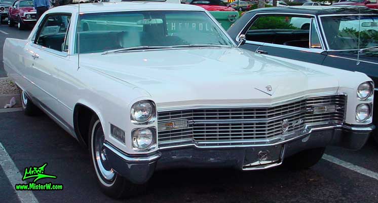 Photo of a white 1966 Cadillac 2 Door Hardtop Coupe at the Scottsdale Pavilions Classic Car Show in Arizona. 1966 Cadillac Coupe