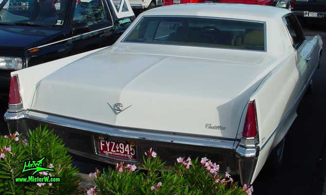 Photo of a white 1969 Cadillac 2 Door Hardtop Coupe DeVille at the Scottsdale Pavilions Classic Car Show in Arizona. 1969 Cadillac Rearview