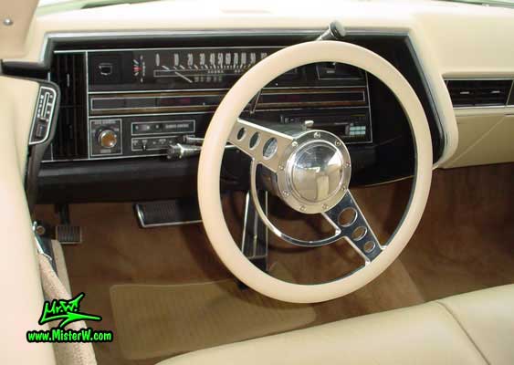 Photo of a white 1970 Cadillac Convertible at the Scottsdale Pavilions Classic Car Show in Arizona. 1970 Cadillac Odometer