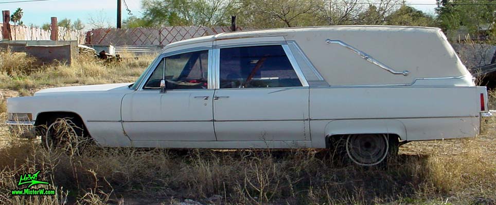 Photo of a white 1970 Cadillac Hearse in Tucson, Arizona. Huge 70 Caddilac Superior 3 Way Hearse with Suicide Doors