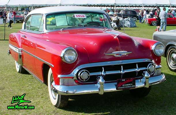 Photo of a red 1953 Chevrolet Bel Air 2 Door Hardtop Coupe at a classic car auction in Scottsdale, Arizona. 1953 Chevrolet Coupe