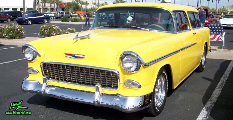 Photo of a yellow 1955 Chevrolet Bel Air Nomad 2 Door Station Wagon at the Scottsdale Pavilions Classic Car Show in Arizona. 1955 Chevrolet Bel Air Nomad Station Wagon