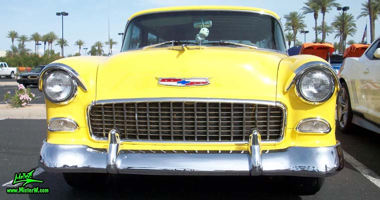 Photo of a yellow 1955 Chevrolet Bel Air Nomad 2 Door Station Wagon at the Scottsdale Pavilions Classic Car Show in Arizona. 1955 Chevrolet Bel Air Nomad Frontview