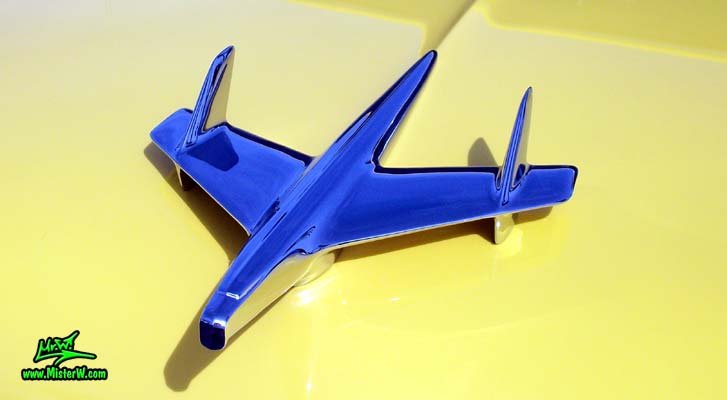 Photo of a yellow 1955 Chevrolet Bel Air Nomad 2 Door Station Wagon at the Scottsdale Pavilions Classic Car Show in Arizona. 1955 Chevrolet Bel Air Nomad Chrome Hood Ornament