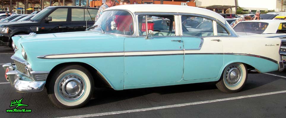 Photo of a white & blue 1956 Chevrolet Bel Air 4 Door Sedan at the Scottsdale Pavilions Classic Car Show in Arizona. 56 Chevy Bel Air