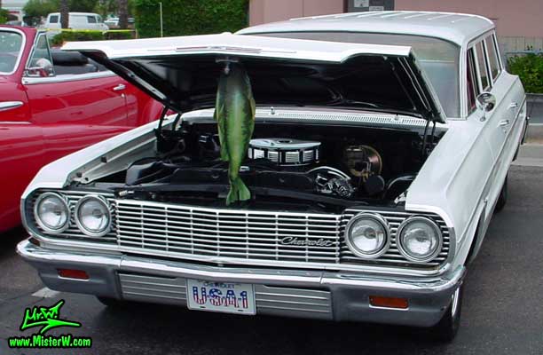 Photo of a white 1964 Chevrolet Stationwagon at the Scottsdale Pavilions Classic Car Show in Arizona. 1964 Chevrolet Stationwagon