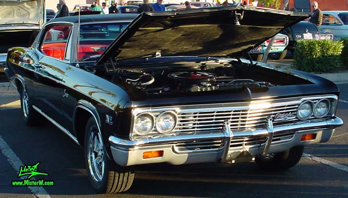 Photo of a black 1966 Chevrolet Caprice 2 door hardtop coupe at the Scottsdale Pavilions Classic Car Show in Arizona. 1966 Chevrolet Caprice