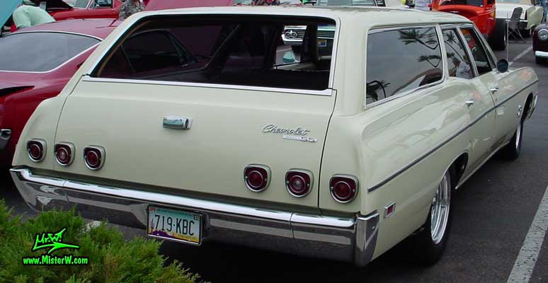 Photo of a white 1968 Chevrolet Impala Stationwagon at the Scottsdale Pavilions Classic Car Show in Arizona. White 1968 Chevy Impala Stationwagon