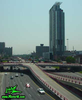 Photo of the Kennedy Expressway, Interstate I-90 / I- 94 in downtown Chicago, taken from a green line subway train in summer 2004 The Kennedy Expressway, Interstate I-90 / I- 94 in Downtown Chicago