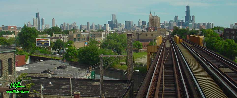 Photo of the downtown Chicago high rise skyscraper skyline, taken from a blue line subway train, close to the Western Milwaukee train station in summer 2004 The Skyline of Chicago