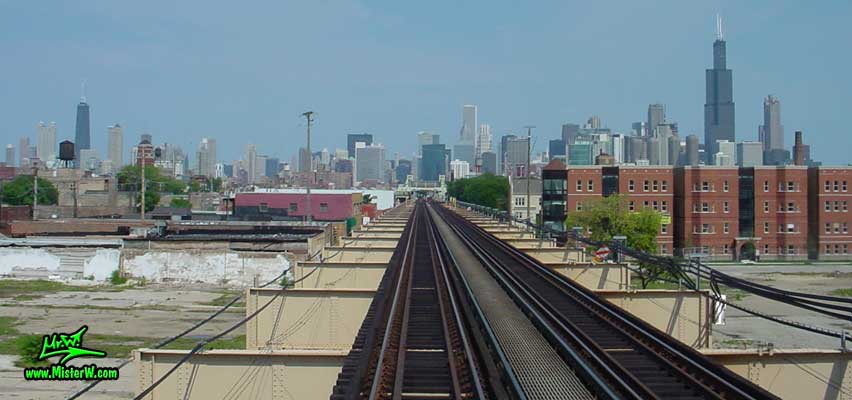 Photo of the skyscrapers of downtown Chicago, taken from a green line subway train, above Lake Street in summer 2004 John Hancock Center, Aon Center & the Sears Tower from the Subway