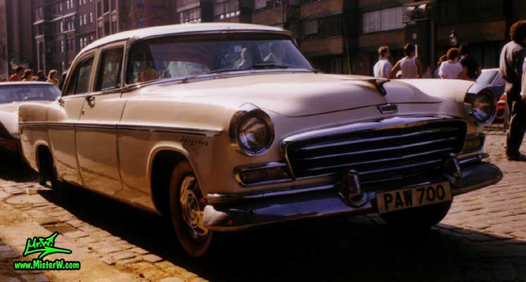 Photo of a white 1956 Chrysler 4 Door Hardtop Sedan at a classic car meeting on the St. Pauli Fischmarkt in Hamburg, Germany. 1956 Chrysler Front