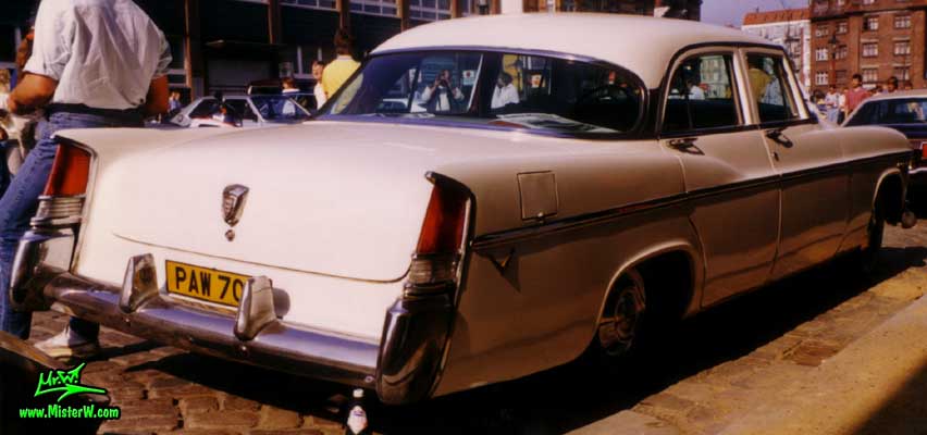 Photo of a white 1956 Chrysler 4 Door Hardtop Sedan at a classic car meeting on the St. Pauli Fischmarkt in Hamburg, Germany. 1956 Chrysler Back