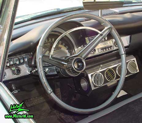 Photo of a turquoise 1960 Chrysler 4 door sedan at the Scottsdale Pavilions Classic Car Show in Arizona. 1960 Chrysler Interior & Dashboard