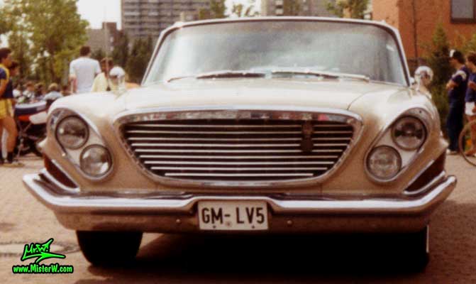 Photo of a tan 1961 Chrysler Newport 4 Door Hartop Station Wagon at a classic car meeting in Germany. 1961 Chrysler Newport Wagon Front Grill