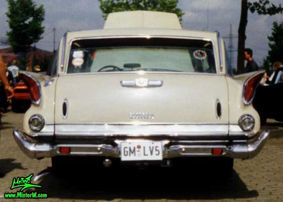 Photo of a tan 1961 Chrysler Newport 4 Door Hartop Station Wagon at a classic car meeting in Germany. 1961 Chrysler Wagon Rearview