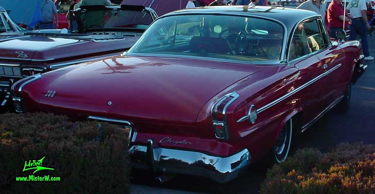 Photo of a red 1962 Chrysler 300 2 Door Hardtop Coupe at the Scottsdale Pavilions Classic Car Show in Arizona. 1962 Chrysler