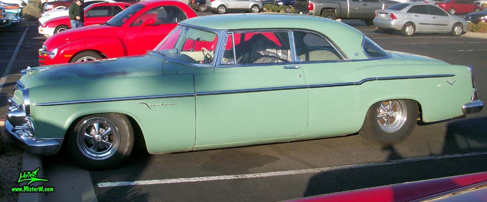 Photo of a turquoise 1955 Chrysler DeSoto Firedome 2 Door Hardtop Coupe at the Scottsdale Pavilions Classic Car Show in Arizona. 55 DeSoto Firedome Coupe