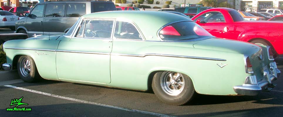 Photo of a turquoise 1955 Chrysler DeSoto Firedome 2 Door Hardtop Coupe at the Scottsdale Pavilions Classic Car Show in Arizona. 1955 DeSoto