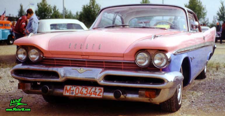 Photo of a pink & violet 1959 Chrysler DeSoto 2 Door Hardtop Coupe at a Classic Car Meeting in Germany. 1959 DeSoto Coupe Frontview