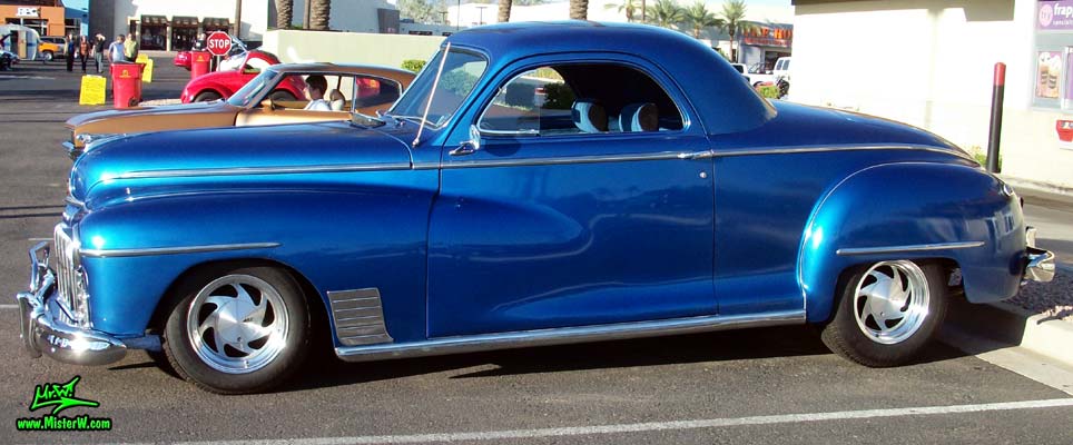Photo of a blue metallic 1948 Dodge 3 Window Coupe at the Scottsdale Pavilions Classic Car Show in Arizona. 1948 Dodge 3 Window 2 Door Hardtop Coupe