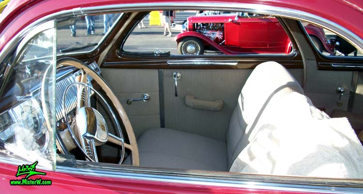 Photo of a red 1948 Dodge 5 Window Coupe at the Scottsdale Pavilions Classic Car Show in Arizona. 1948 Dodge 5 Window Coupe Interior