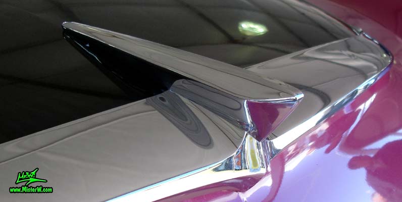 Photo of a Black, Purple & White 1955 Dodge Custom Royal Lancer 2 Door Hardtop Coupe at a Classic Car Auction in Scottsdale, Arizona. Hood Ornament of a 1955 Dodge Custom Royal Lancer Coupe