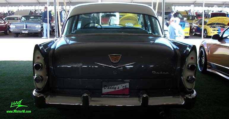 Photo of a white, pink & charcoal grey 1956 Chrysler Dodge Royal 4 Door Sedan at a Classic Car Auction in Scottsdale, Arizona. Rearview of a 1956 Dodge Royal