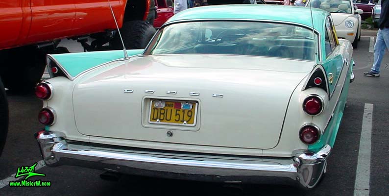 Photo of a white & turquoise 1957 Chrysler Dodge Coronet 2 Door Hardtop Coupe at the Scottsdale Pavilions Classic Car Show in Arizona. Rearview of a 57 Dodge Coronet