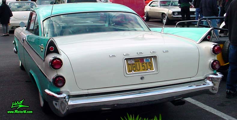 Photo of a white & turquoise 1957 Chrysler Dodge Coronet 2 Door Hardtop Coupe at the Scottsdale Pavilions Classic Car Show in Arizona. 1957 Dodge Tailfins