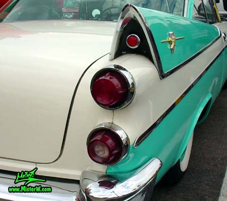 Photo of a white & turquoise 1957 Chrysler Dodge Coronet 2 Door Hardtop Coupe at the Scottsdale Pavilions Classic Car Show in Arizona. 1957 Dodge Tailfin & Rear Light