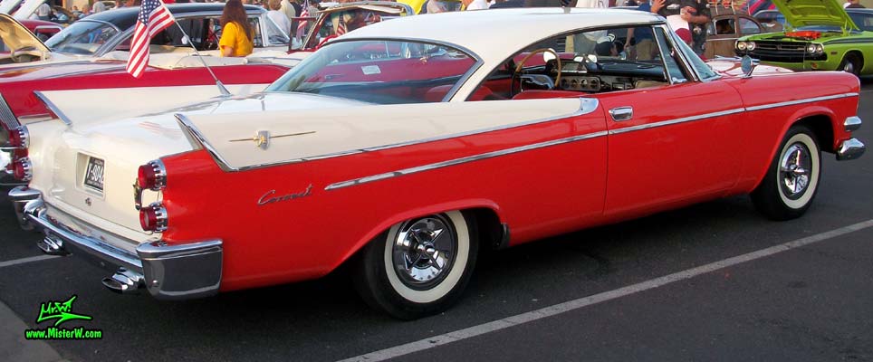 Photo of a red & white 1958 Chrysler Dodge Coronet 2 Door Hardtop Coupe at the Scottsdale Pavilions Classic Car Show in Arizona. Beautiful Side Lines of a 58 Dodge Coupe