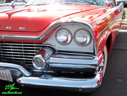 Photo of a red & white 1958 Chrysler Dodge Coronet 2 Door Hardtop Coupe at the Scottsdale Pavilions Classic Car Show in Arizona. 1958 Dodge Head Lights